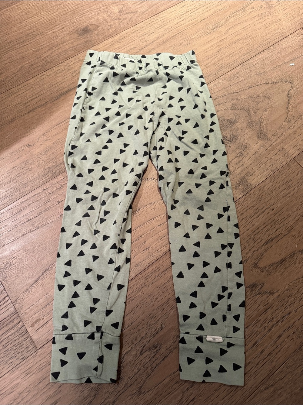 Turtledove London Sage Green Leggings with Black Triangle Print
